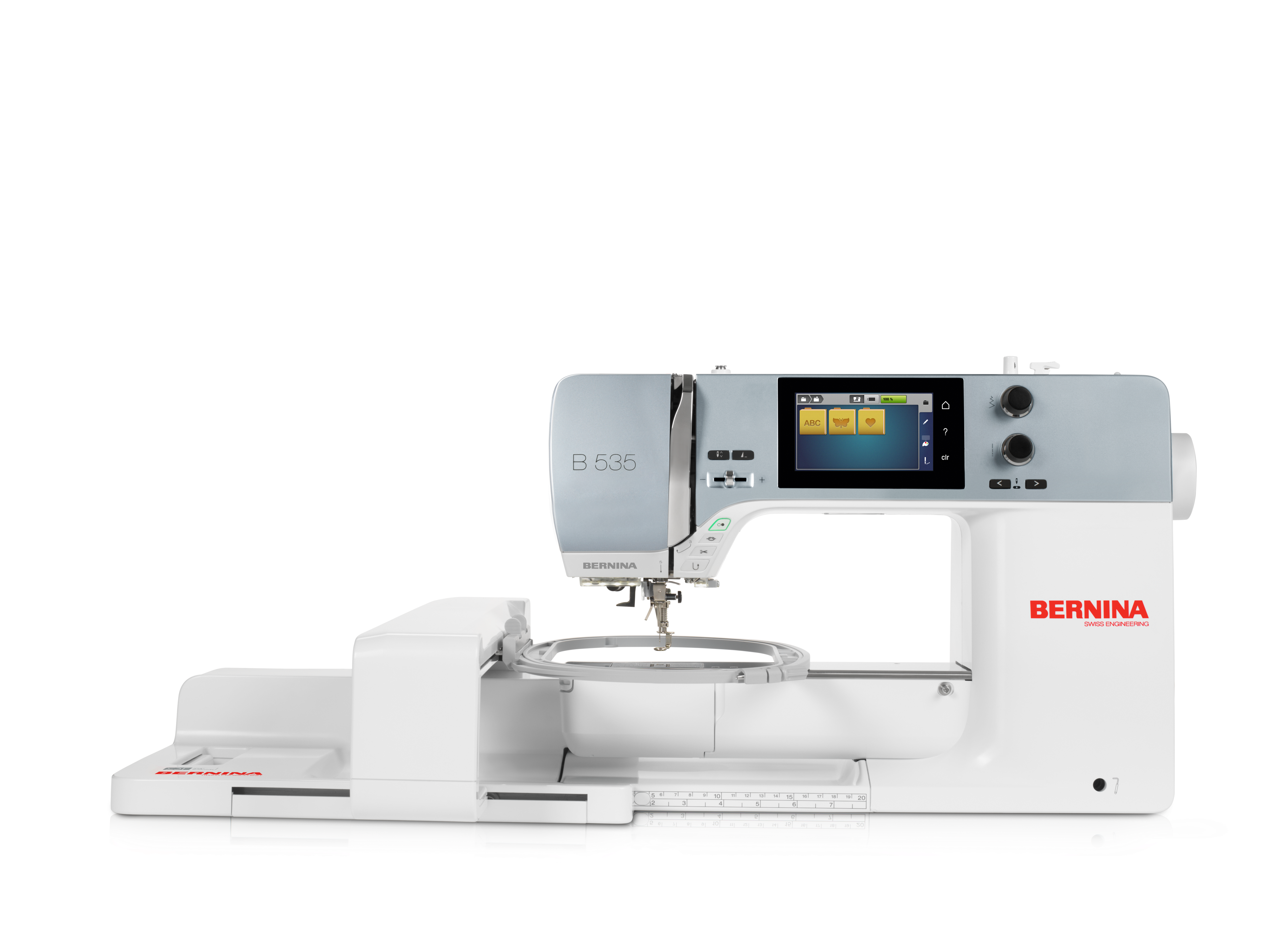 strange image of the BERNINA 535E Sewing and Embroidery Machine with module and hoop attached