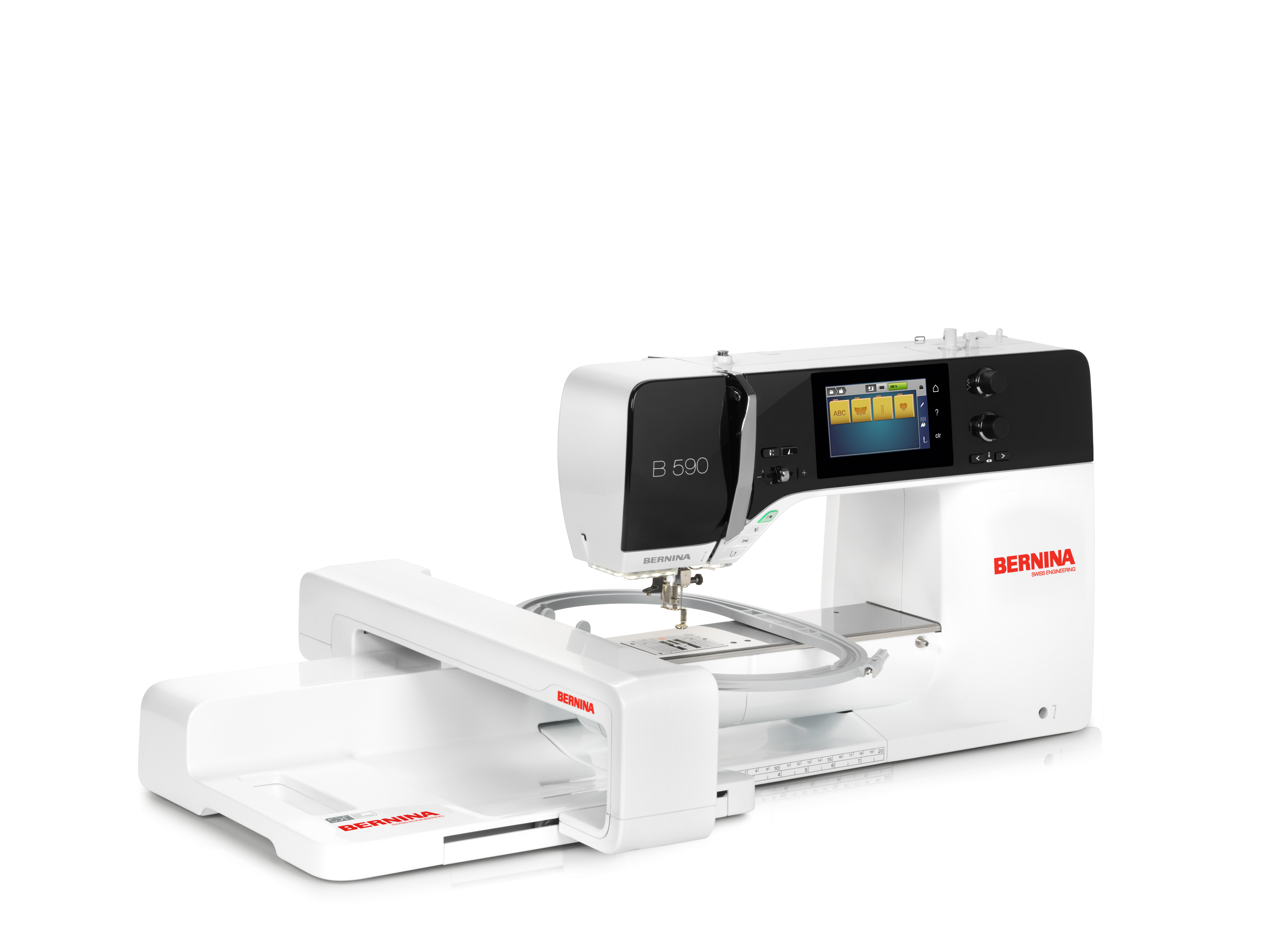 angled image of the BERNINA 590E Sewing and Embroidery Machine with module and hoop attached