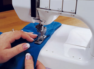Janome CoverPro 900CPX Coverstitch Serger Machine close up being used