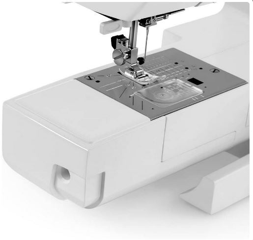 close up image of the Janome 4120QDC-T Sewing Machine needle plate