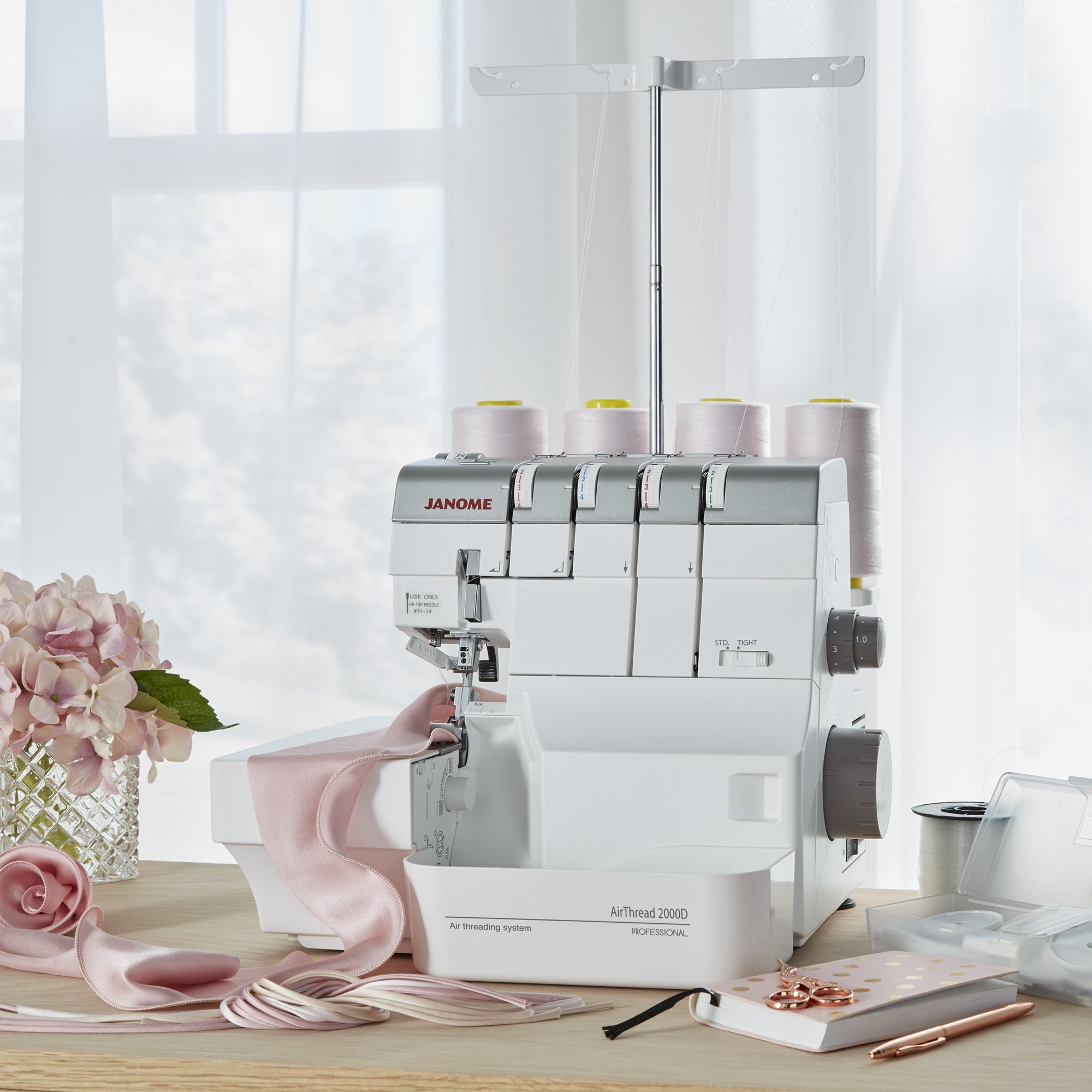 image of the Janome AT2000D Air Thread Serger Machine on a table