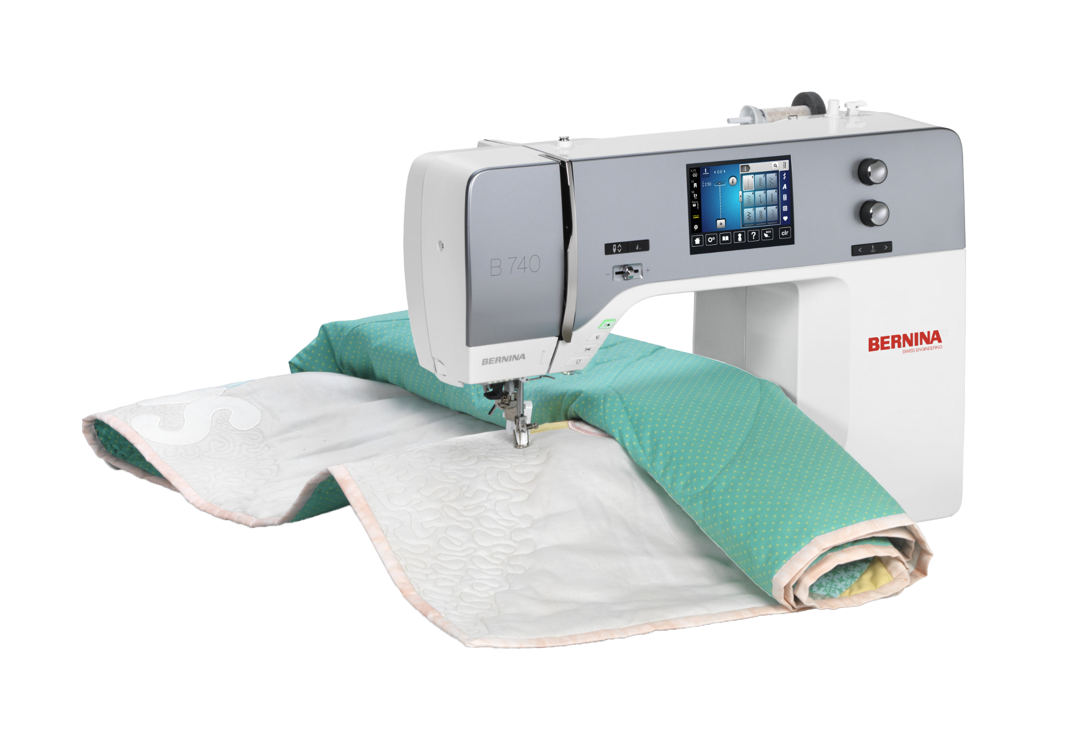image of the online exclusive BERNINA 740 Sewing Machine with a quilt
