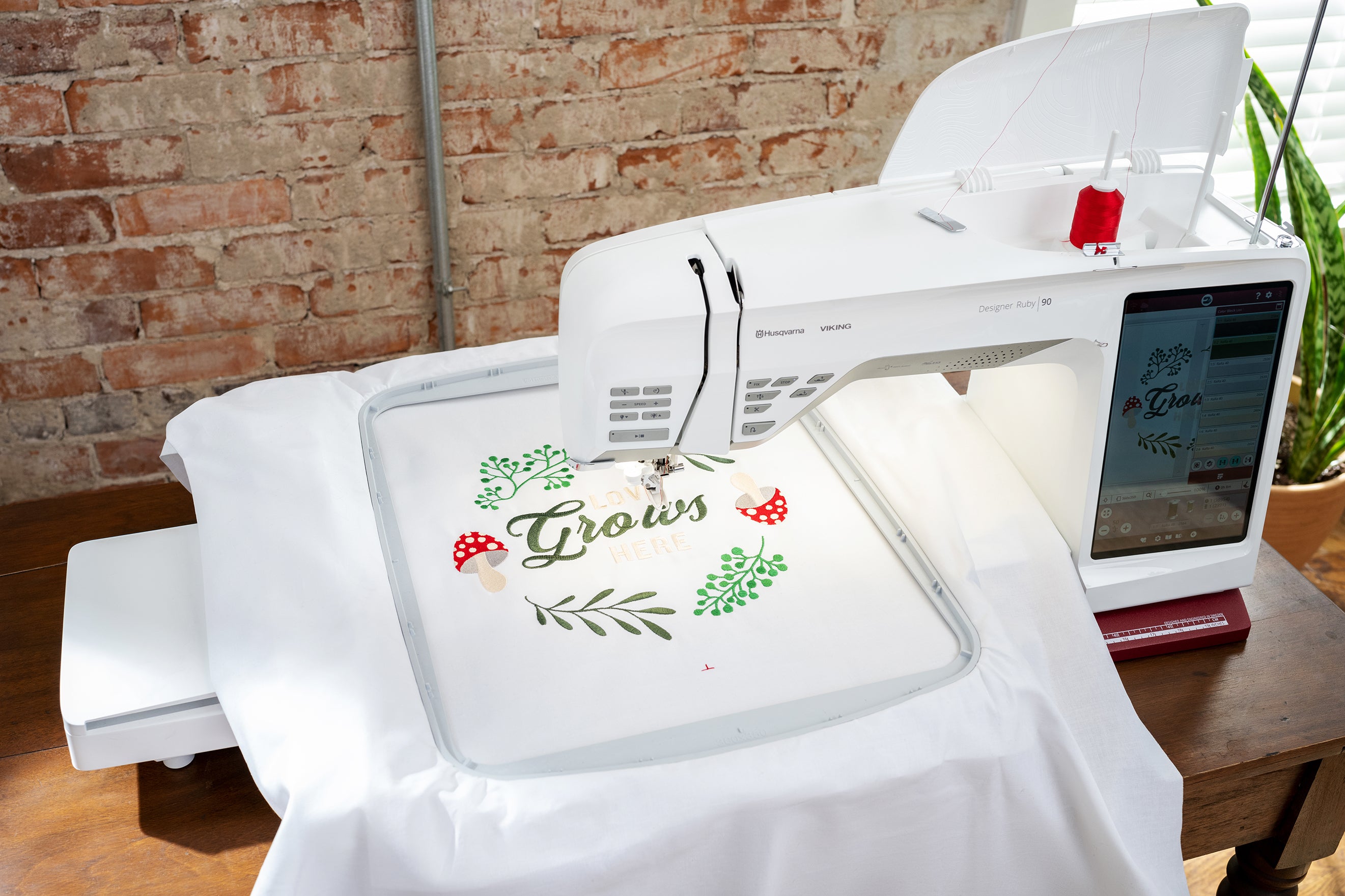 Husqarna Viking Designer Ruby 90 Sewing and Embroidery Machine with hoop and embroidery project attached