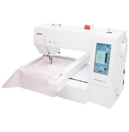 angled image of the Janome MC400E Embroidery Machine with hoop attached