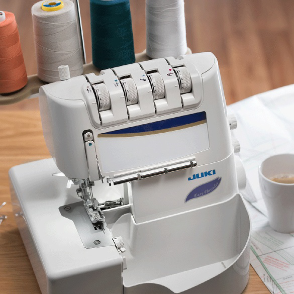 JUKI 40134096 Serger Waste Collector attached to a machine
