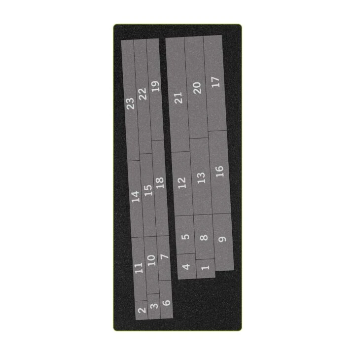 A black rectangular card or mat with two gray numbered strips laid diagonally across it, showing numbers from 1 to 23 in white text.