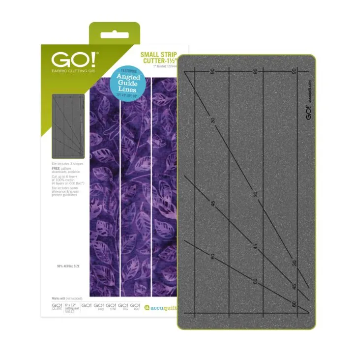Gray fabric cutting die with measurement lines and purple fabric strip on a white background