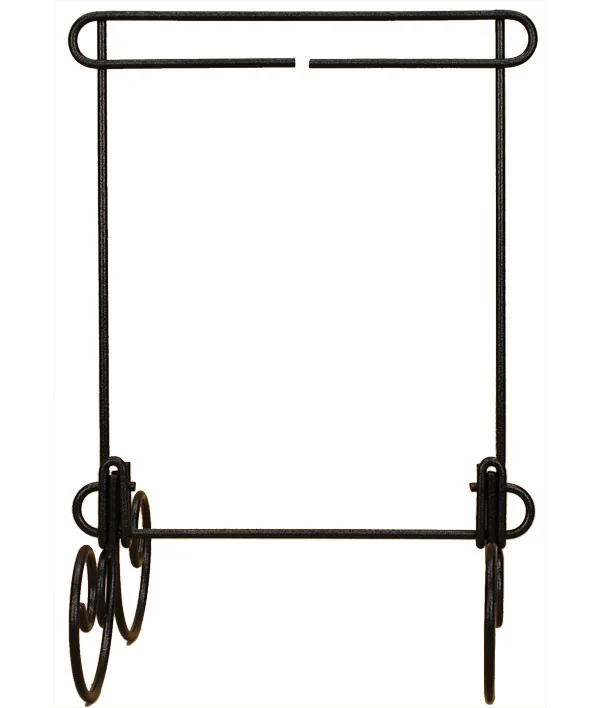 Black metal quilt book stand with springs on a white background