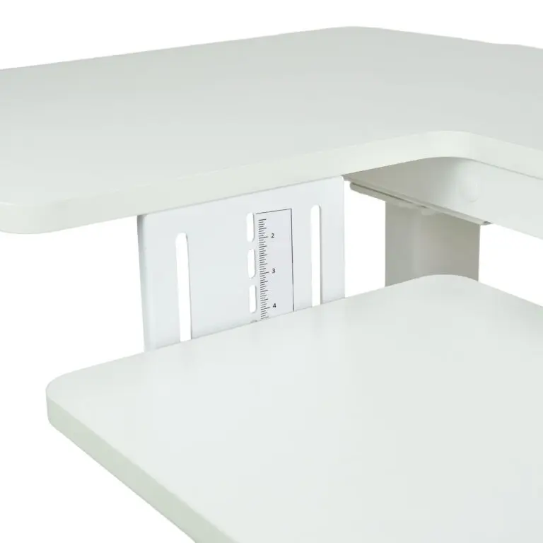 White craft table with ruler measurements on a white background