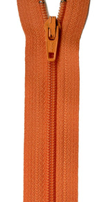Close-up of a bright orange zipper with matching orange pull tab on a white background.