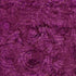 Close-up of a purple fabric with circular pattern