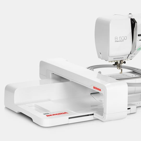 Embroidery machine with a stand on a white background