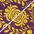 Purple fabric with yellow floral embroidery pattern