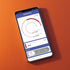 Smartphone displaying a sewing app app on an orange background