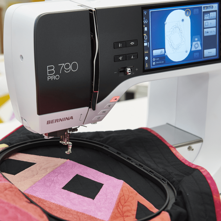 Bernina B790 Pro sewing machine with a quilt on a table