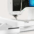 A close-up of a BERNINA B 790 PLUS sewing machine in white and black, showing the needle area, front panel, and part of the digital display screen.