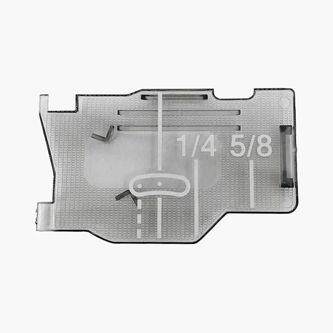 A translucent gray plastic replacement filter or cover with white printed measurement markings reading 1/4 and 5/8, shown on a plain light gray background.