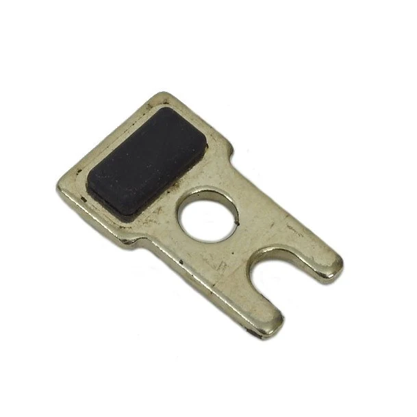 A small metal component with a circular hole and a black rectangular rubber piece on a plain white background.