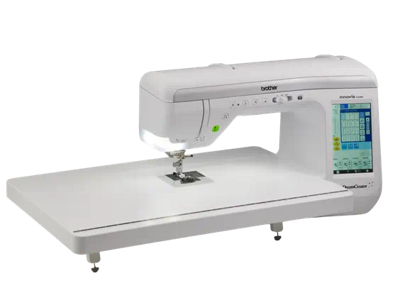 White sewing machine with digital display on a white background