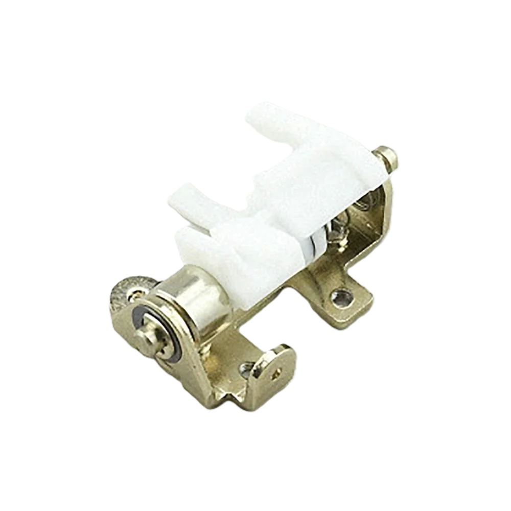 A small metal mechanical component with a white plastic insert, photographed on a plain white background.