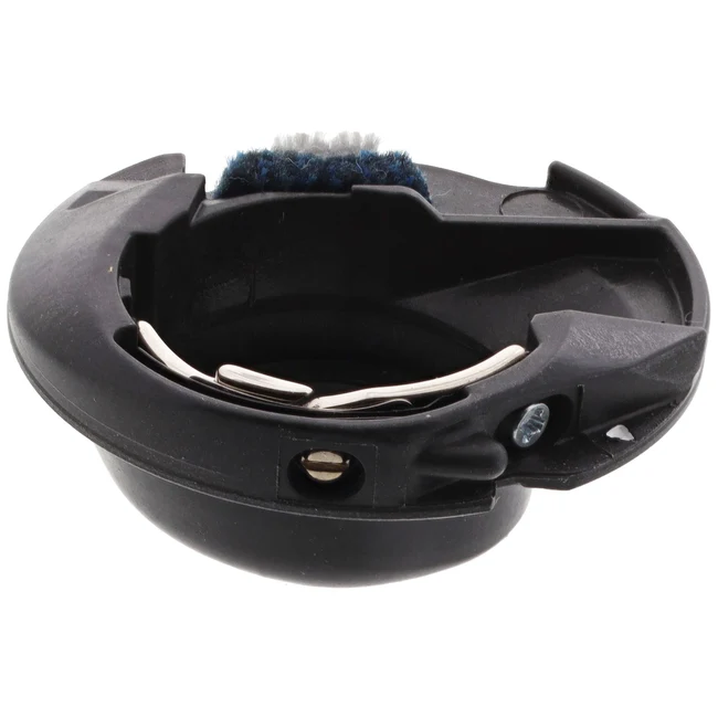 Black plastic bobbin case featuring a circular base, mounting clips, and a blue-and-white bristle brush.