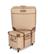 A beige quilted luggage storage system consisting of a tall upright bag and a matching wheeled storage box, both with brown trim and a visible Designio logo patch.