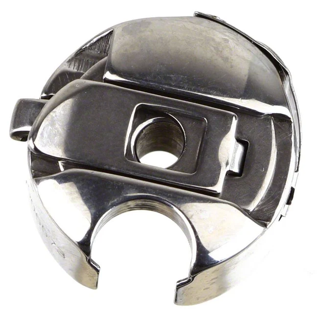 A polished bobbin case shown on a plain white background.
