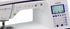Innovis sewing machine with digital display on a white background