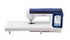 A Brother Quillcraft sewing machine with an extended white quilting table base and a dark blue digital touchscreen control panel, shown against a plain white background.