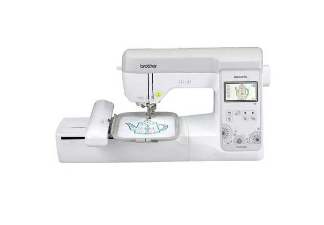 Brother sewing machine with embroidery hoop on a white background