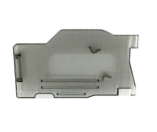 A translucent gray plastic replacement part with a textured surface and molded cutouts, shown on a plain white background.