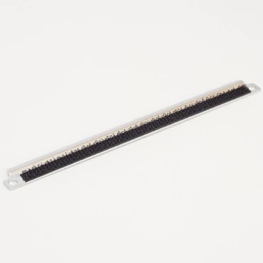 Long rectangular object with black and white pattern on a white background