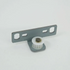 A small metal hardware component with a flat gray bracket, a white plastic gear, and a gold-toned central pin, photographed on a clean white background.
