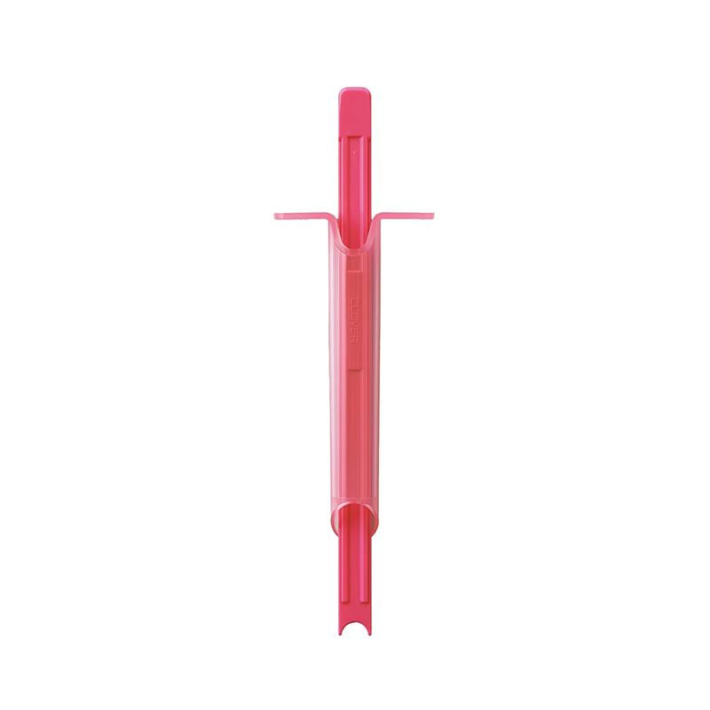 Red plastic tool on a white background
