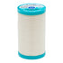 Spool of Coats Cotton Covered thread with blue label on a white background
