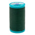 Spool of green thread with a Coats label on a white background