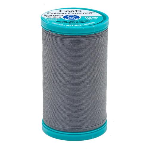 Spool of Coats Cotton-Overlock thread on a white background