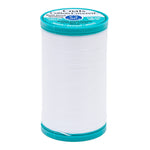 Spool of white thread with teal lid on a white background