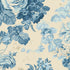 A repeating floral pattern featuring blue and light blue flowers with leaves on a warm beige background.