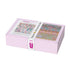 Pink quilt kit box with fabric samples on a white background