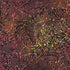 Patterned fabric with abstract designs in orange, yellow, and red on a dark background