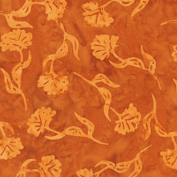 Pattern of leaves and flowers in gold on a brown background