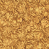 A close-up of a repeating batik pattern featuring stylized tropical leaves and floral motifs in warm golden-brown and tan tones.