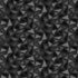 A seamless geometric pattern of interlocking triangles in shades of black, dark gray, and charcoal gray.