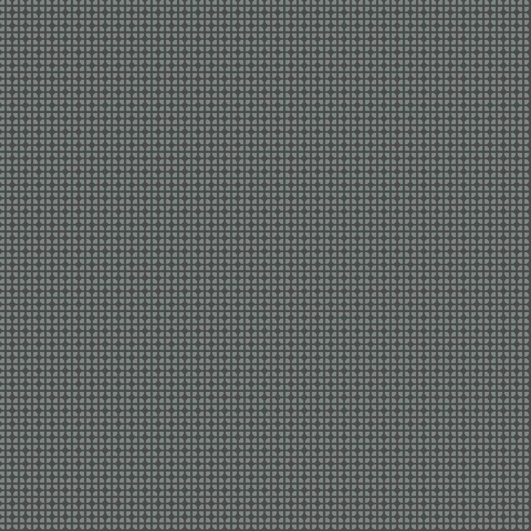 A close-up of a dark gray textured material with a repeating small geometric pattern.