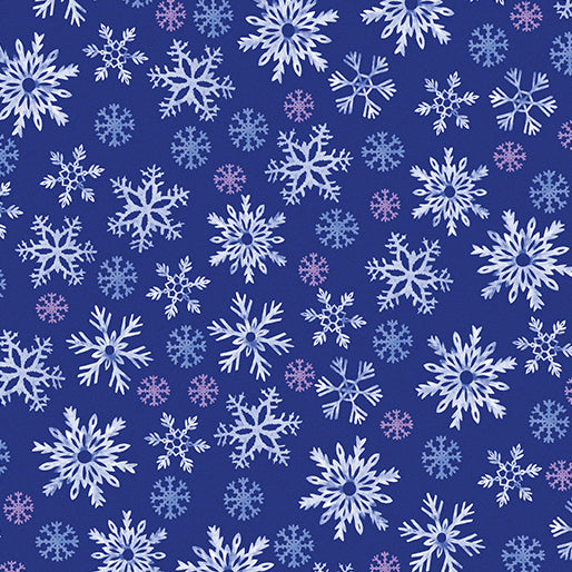 Pattern of white snowflakes on a blue background