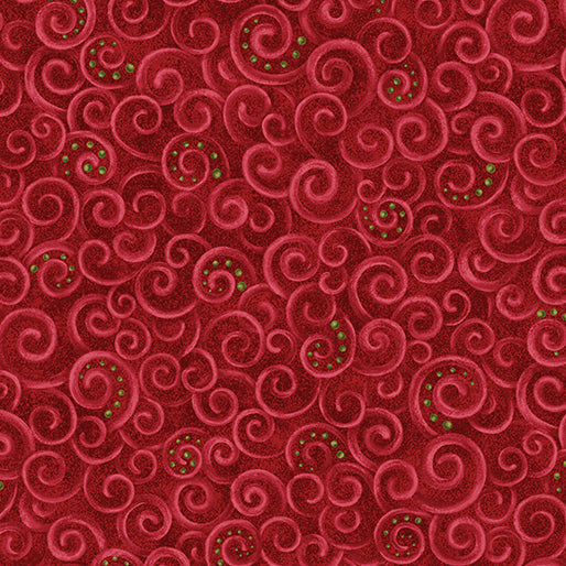 Red patterned fabric with swirling designs on a red background