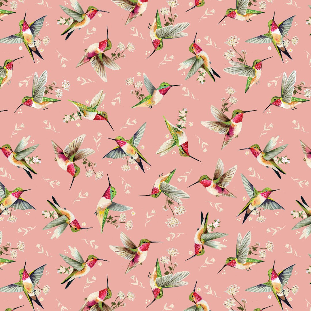 A repeating pattern of watercolor-style hummingbirds in green, pink, white, and yellow on a dusty pink background, with small white floral motifs scattered throughout.