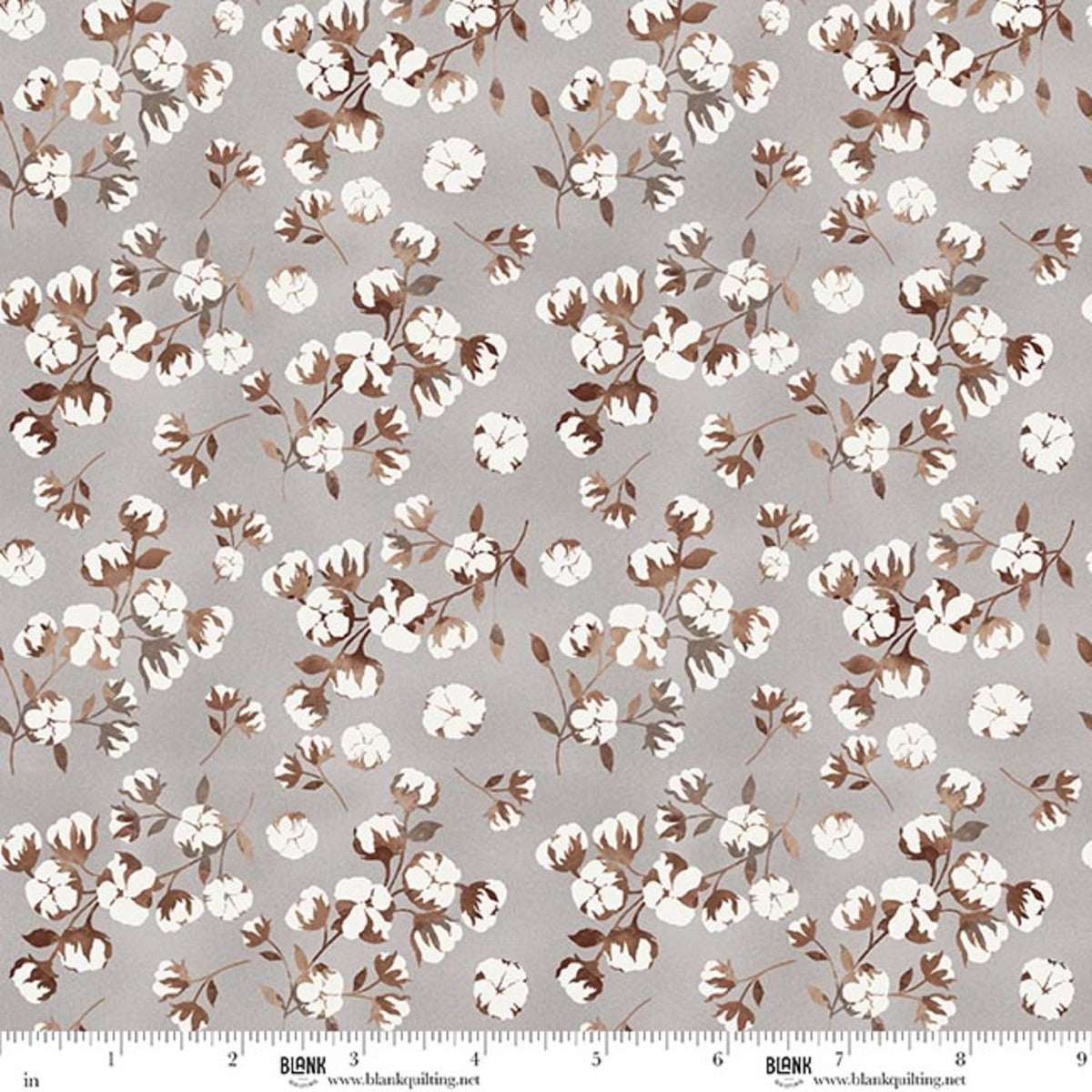 Floral pattern fabric swatch with white and brown flowers on a gray background, featuring a ruler at the bottom.