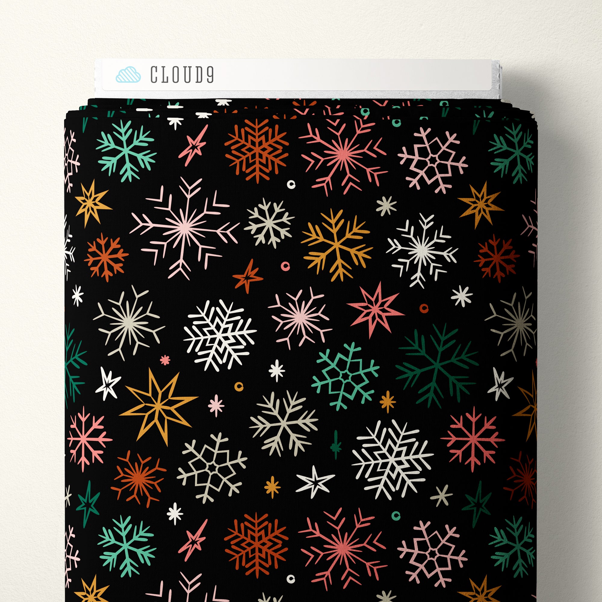 Colorful snowflake pattern on a black background with 'Cloud9' branding.